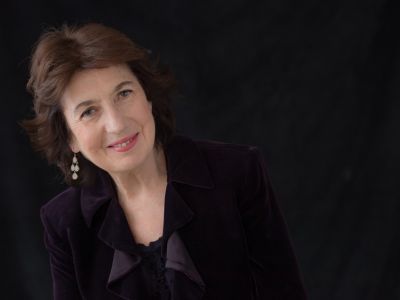 headshot of Imogen Cooper smiling